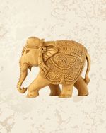 Royal wooden elephant décor piece featuring detailed handcrafted carving.