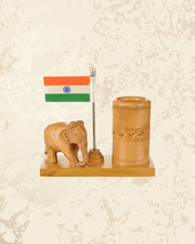 Handmade wooden pen stand with elephant motif for desk decoration