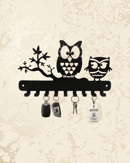 Owl family metal wall decor key holder with hooks, perfect for organizing keys in your entryway.