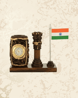 Painted wooden pen stand with Indian flag design, built-in clock, and stationery compartments.