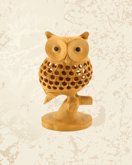 Traditional wooden owl decorative showpiece with intricate handcrafted detailing for home decor.