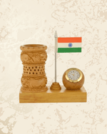 Traditional wooden desk organizer featuring pen holder compartments, Indian flag artwork, and analog clock.