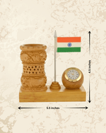 Patriotic carved wooden pen stand with built-in analog clock for office desks and study tables.