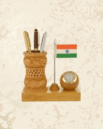Handcrafted wooden pen stand with Indian flag design, analog clock, and traditional carved details.